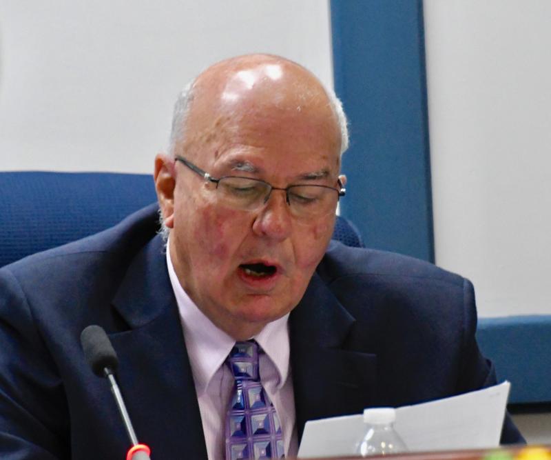 Sussex County Council President Mike Vincent reads one of two motions affirming the planning & zoning commission’s approval of the Coral Lakes subdivision.