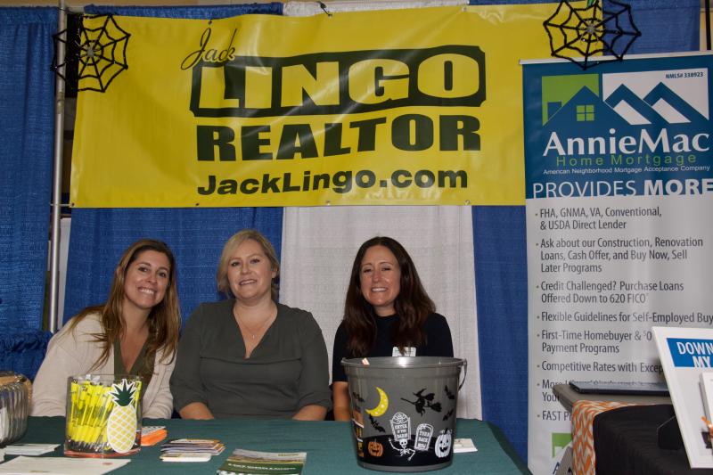 Molly Bayard, left, and Melinda Ingram of Jack Lingo and Jennifer DeLuca from AnnieMac Home Mortgage were a one-stop shop for prospective home buyers and spiders.