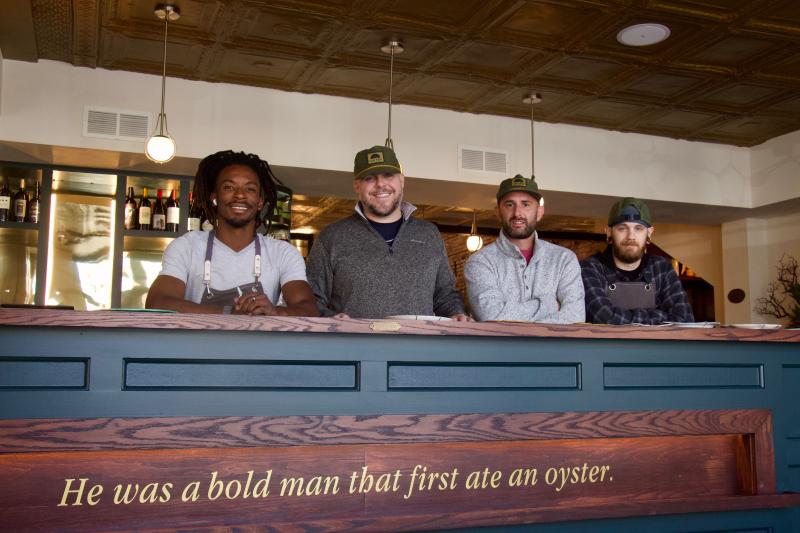 These four bold men are embarking on a voyage to deliver fine local flavors from across the Cape region to Lewes residents and visitors. Shown are (l-r) head mixologist Sean Norris, founder Tom Little, founder Sean Corea, and Chef de Cuisine Dillon Walker.