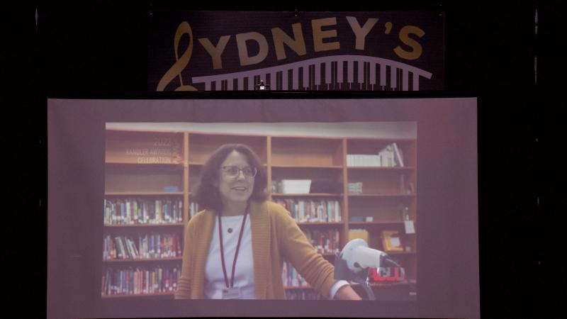 A short video was shown highlighting the efforts of Rebecca Lowe while working at the library and in her community.