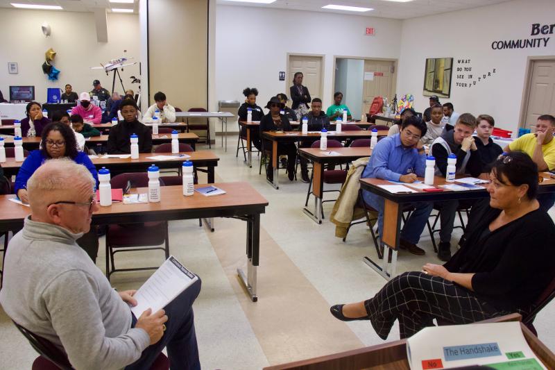 Dr. Thomas Maguire, founder of Higher ED Assist, conducts a mock interview with academic coach Jennifer Thompson. A disinterested Thomas exhibited mostly what not to do in an interview so participants see firsthand.