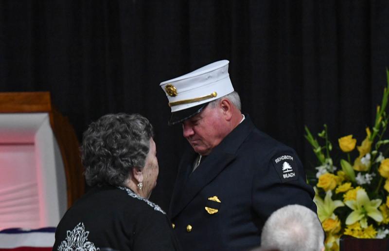 Station 86 member and Mitchell’s childhood friend Leonard C. Tylecki shares a moment with Mitchell’s mother Shirley.