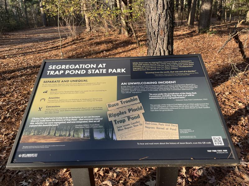 New signage tells the story of segregation at Trap Pond State Park even though state parks were technically not segregated.