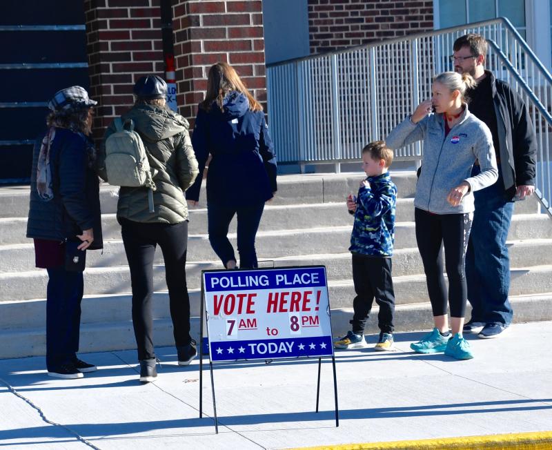 A crowd of voters enter and leave the Lewes Elementary School polling place two hours after the polls opened. RON MACARTHUR PHOTO