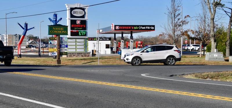 Making a left turn from Nassau Commons Boulevard onto Route 9 is time consuming most of the day. A traffic signal is proposed at the intersection. RON MACARTHUR PHOTO