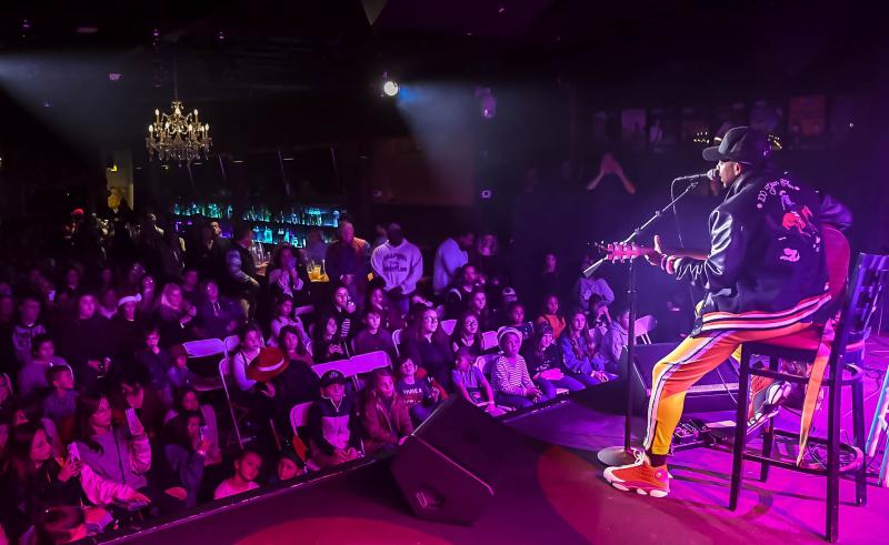 Jimmie Allen sings to the young audience at Friday’s performance for the under-21 crowd.