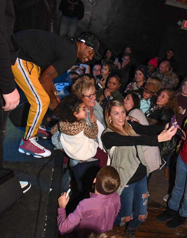 Courtney Biggers takes a selfie with Jimmie Allen, her daughter Nora, and her grandmother Liz Zehner.