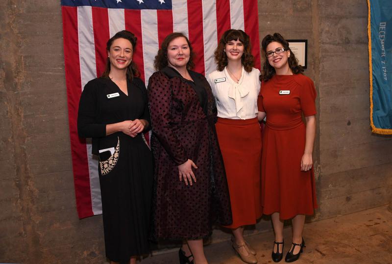 The Homefront Holidays dance party staff in 1940s fashions included (l-r) Emily Mathews, interpreter with Delaware Seashore State Park; Breanna Pierce, administrative assistant and tour coordinator for First State Heritage Park; Rachel Sheffield, lead interpreter for First State Heritage Park; and Nicole Worthley, superintendent of First State Heritage Park. DAN COOK PHOTOS