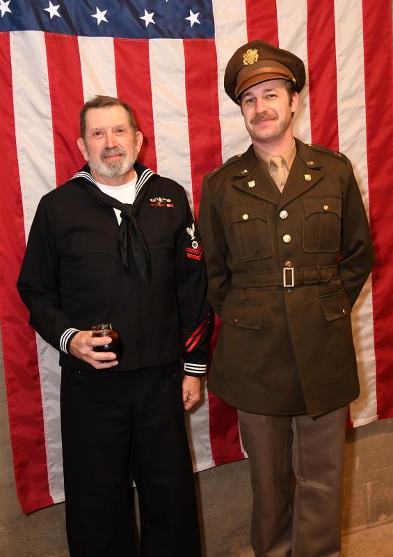Wearing the uniforms of the Navy and Army are Navy veteran John Warren, left, and Delaware State Parks employee Ryan Schwartz.