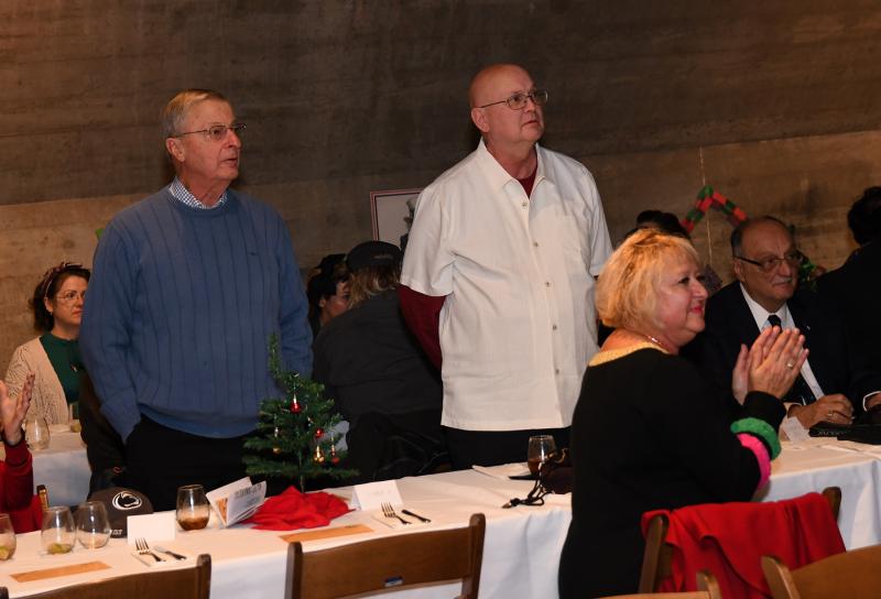 Recognized during the Armed Forces Medley are Army veterans Freddy Jalot Jr., left, and Bruce St. Clair.