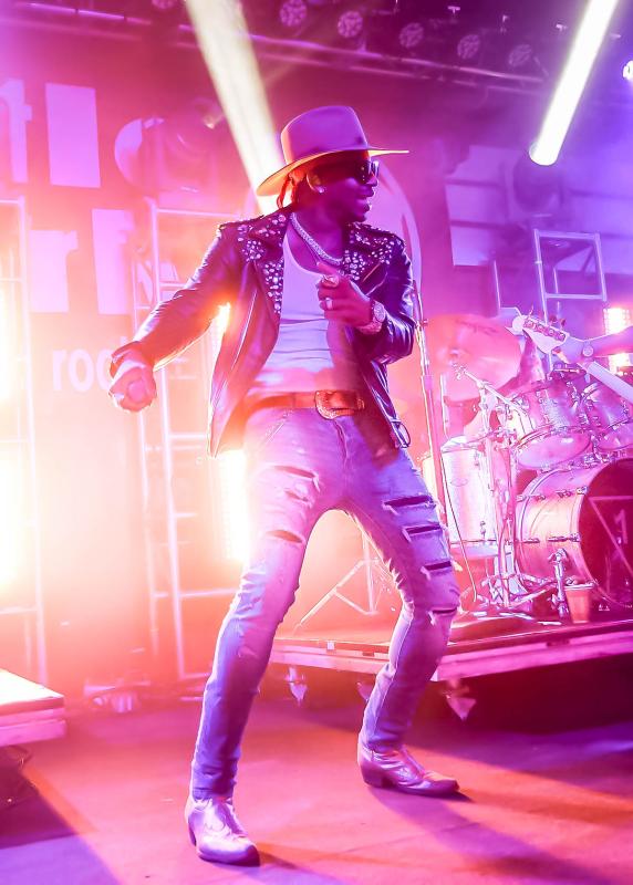 Jimmie Allen shows some dance moves during the sold-out concert.
