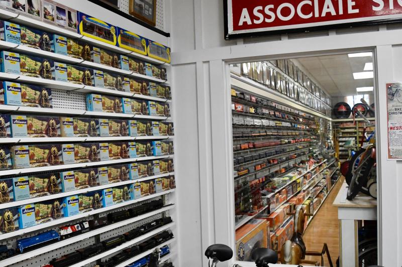 It’s not a mirror. One wall of Boyer’s extensive collection leads to another wall of trains in the Western Auto Museum, which shares a building with the train display.