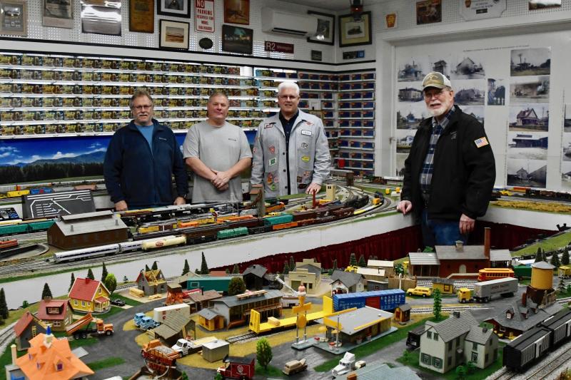 The train men (l-r) Ronnie Gillespie, Kevin Brown, Chris Black and Jim Bowden have devoted countless hours to bringing Jimmy Boyer’s train layout back to life.