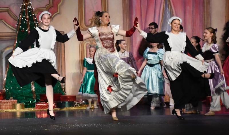 Lorilyn O’Day, Claudia Walker and Helena Zimmer (l-r) dance in the party scene during the first act.