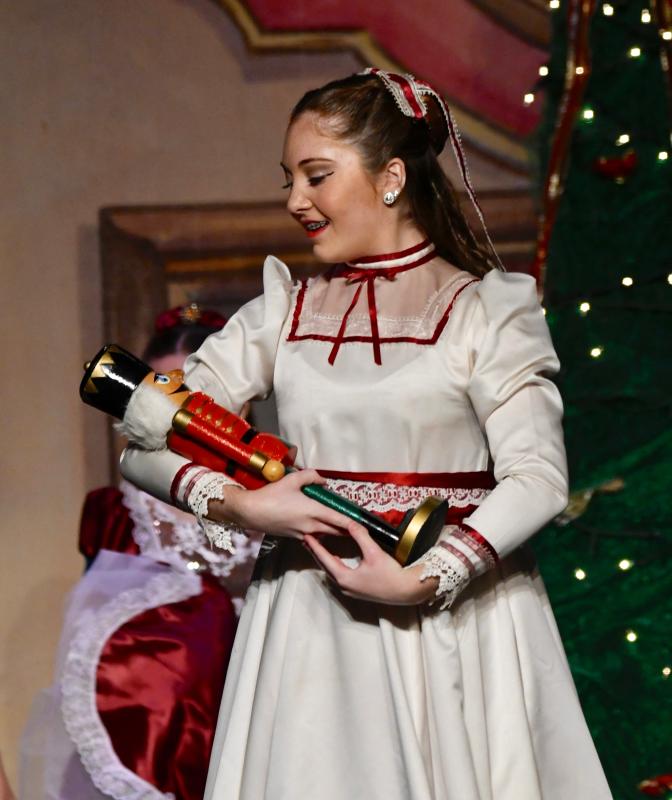Clara, as portrayed by Addison McIlvaine, receives the gift of the Nutcracker, setting off a series of dreams.