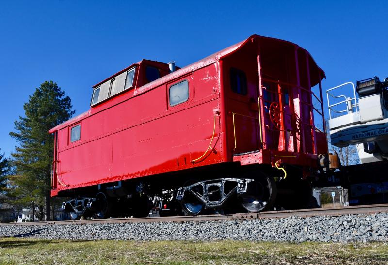 The bright-red, 105-year-old restored caboose is the first piece in the Lewes Junction Railroad & Bridge Association railroad history display.