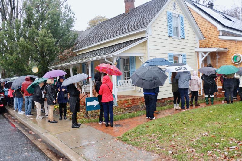 The line outside 125 Jefferson St. spilled onto the sidewalk, much like several of the lines at the featured homes.