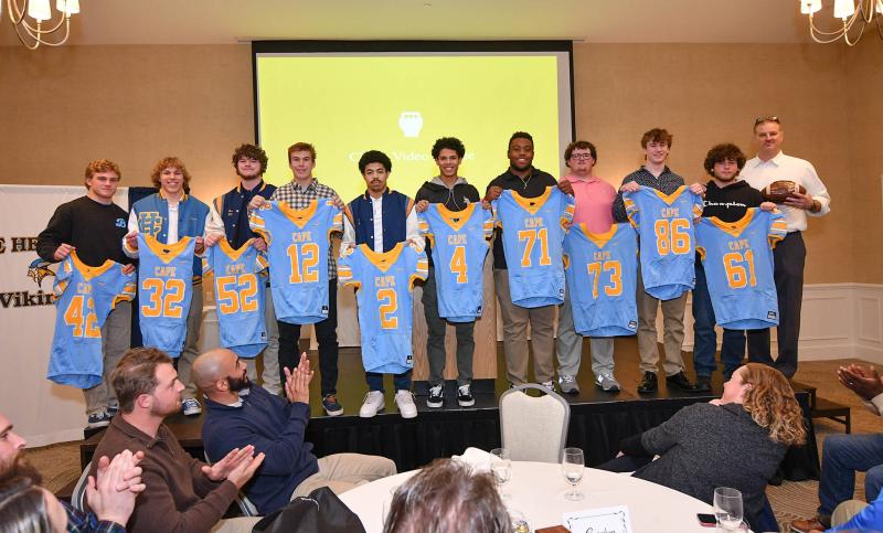 Cape football seniors were presented their jerseys from the Cape board. Shown are (l-r) C.J. Fritchman, Ethan Felker, Nate Horn, Joe Coveleski, Thomas Messick, Keishawn Mansfield, Thomas Gibbs, Ryan Betins, Nathaniel Sullivan and Adam Callahan. Head coach Mike Frederick was presented with a signed ball from the team.