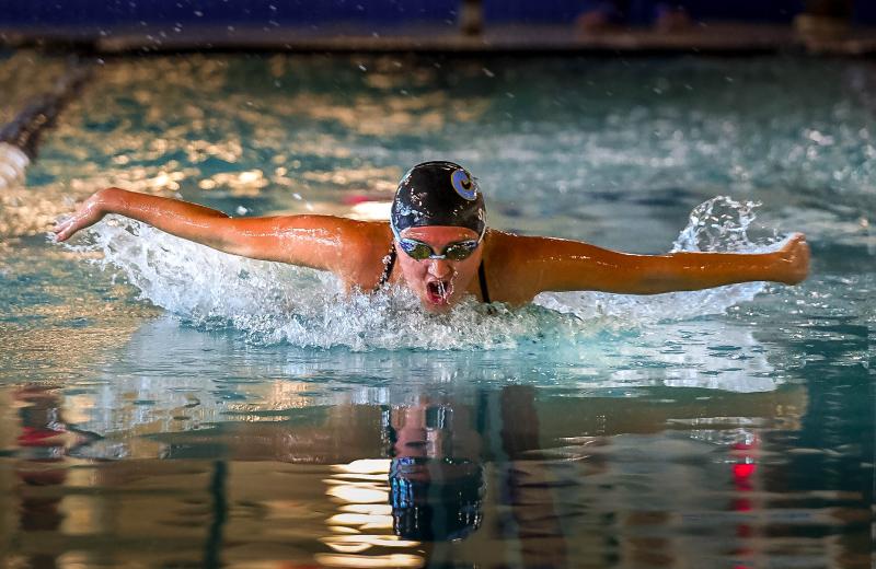 Cape senior Alissa Silva swims the fly leg of the individual medley. She took second place for valuable team points.
