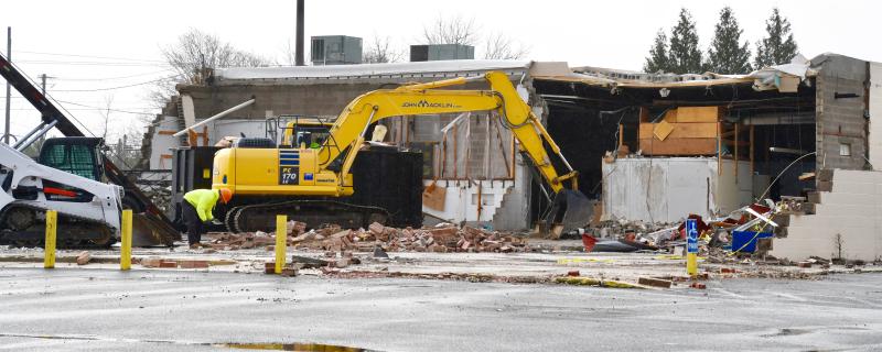 By Jan. 23 (Day 6), the entire front and facade of the former Bests’ Ace Hardware store has been demolished by a John Macklin & Son crew.