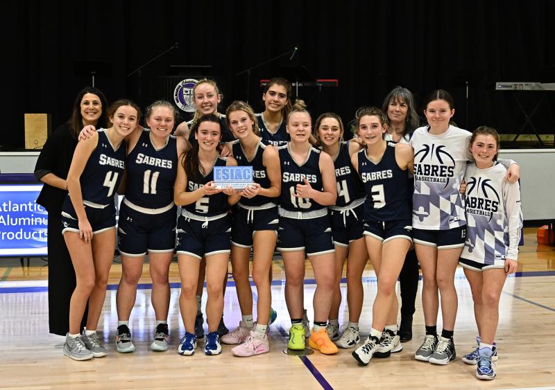 Celebrating their victory in the ESIAC final are the Sabres of Sts. Peter & Paul. Shown in back are (l-r) head coach Katie Murphy, Katie Bryan, Avery McCall and assistant coach Carrie Gould-Kabler. In front are Morgan Quade, Sarah Krocheski, Evelyn Murphy, Hattie Messick, Emily McDaniel, Ashley Reinoehl, Samantha Murphy, Lucy Rankin and Annie Albright.