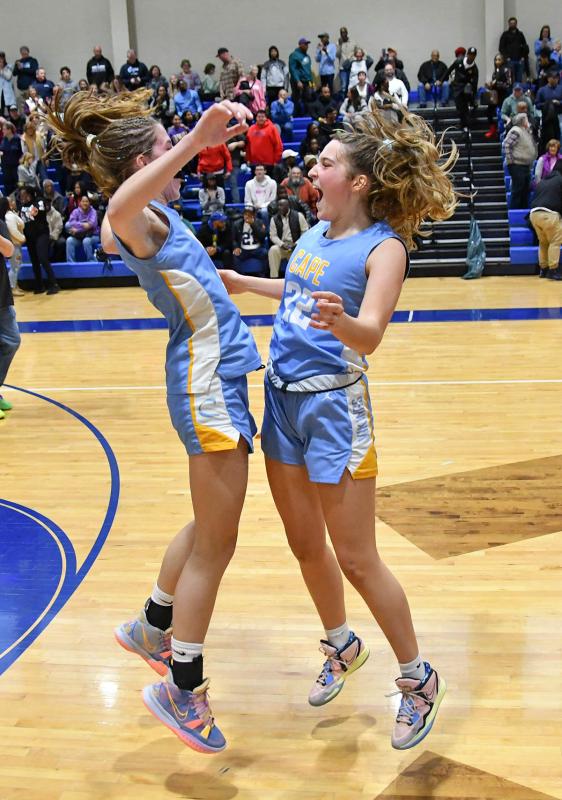 Cape freshman Amalia Fruchtman, left, and sophomore Hayden Hudson do their celebratory chest bump after the win.
