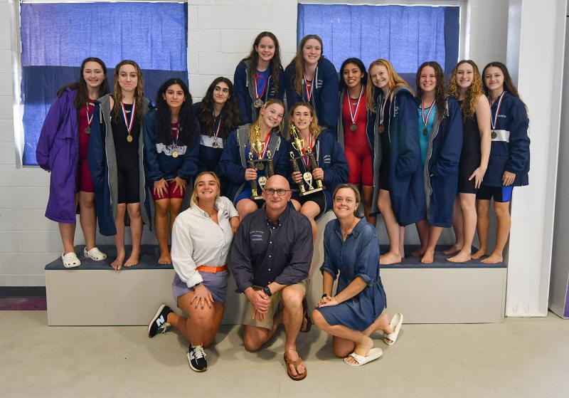 The Sussex Academy girls’ conference champion team members are in back (l-r) Claudia Warren, Caitlin Perchiniak, Camilla Figueroa, Kiki langroudi, Victoria Evans, Gracie Maughan, Itzel Gomez-Sanchez, Addi McKay, Megan Raines, Samantha Petty and lyla Baker. In middle holding trophies are Sanne Elling and Eve Mundok. In front are coaches Tessa Elling, Tom Martiner and Stephanie Hartsoe.