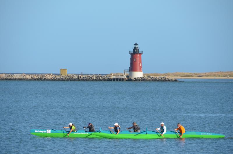 Paddling beside the Delaware Breakwater East End Light are New Hope Canoe Club members (l-r) Amy Reese, Barbara Henry, Gayle Moore, Karl Whitlock, Marc Lopez and David Schofield. SUBMITTED PHOTO