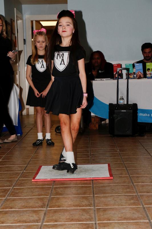 Lily Stuckey observes Erin Mayo, who has been Irish dancing since she was 3 years old. Mayo is making her way to Ireland to compete in an international competition soon.