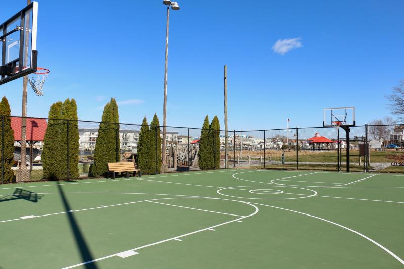 In addition to the new surface, the basketball court was upgraded with new backboards, rims and nets.