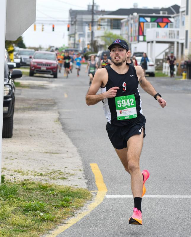 Alex Loper leads the pack of 5K runners to begin a weekend of racing in Rehoboth Beach and Dewey Beach.