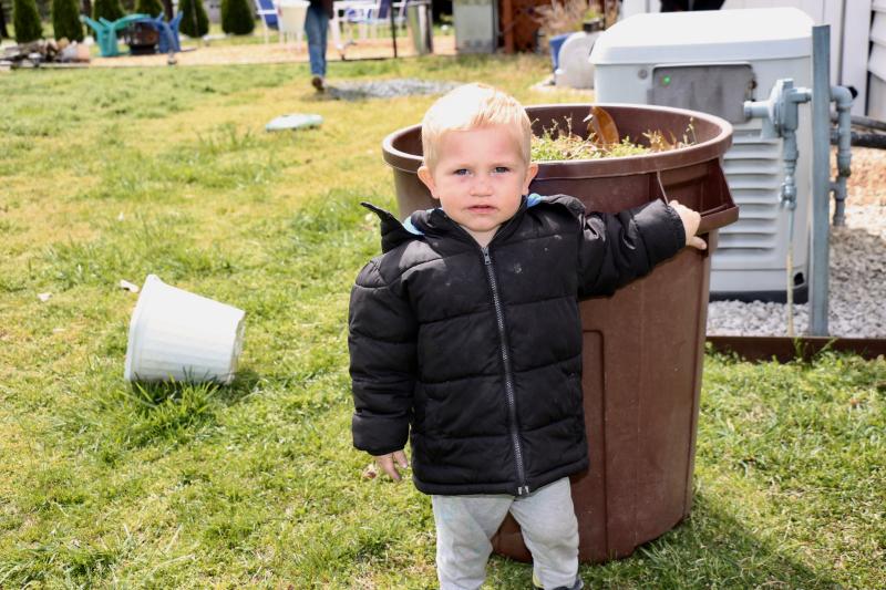 Like a proud fisherman showing off his catch, Josiah Nelson was quite boastful of the bin full of yard waste.