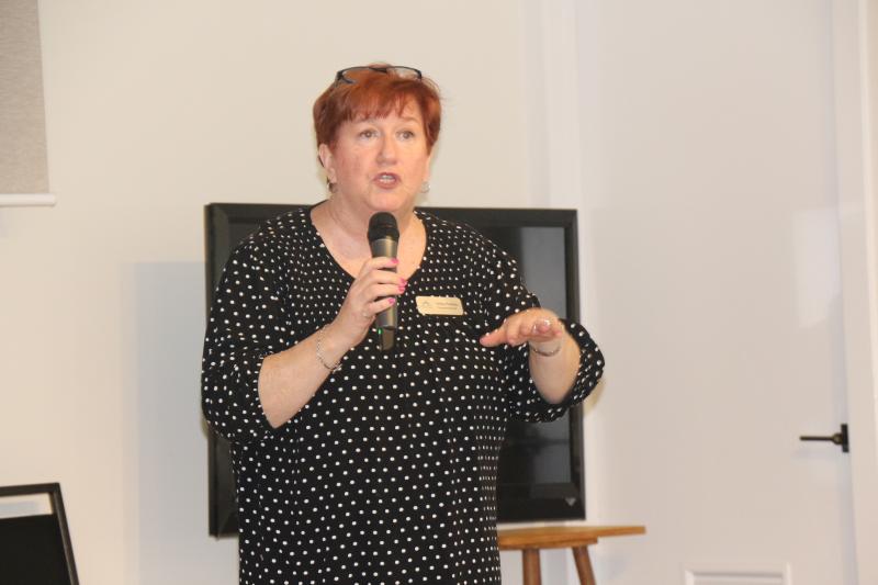 Lewes Senior Activity Center Executive Director Tricia Fleming speaks to volunteers during a celebratory luncheon April 20.