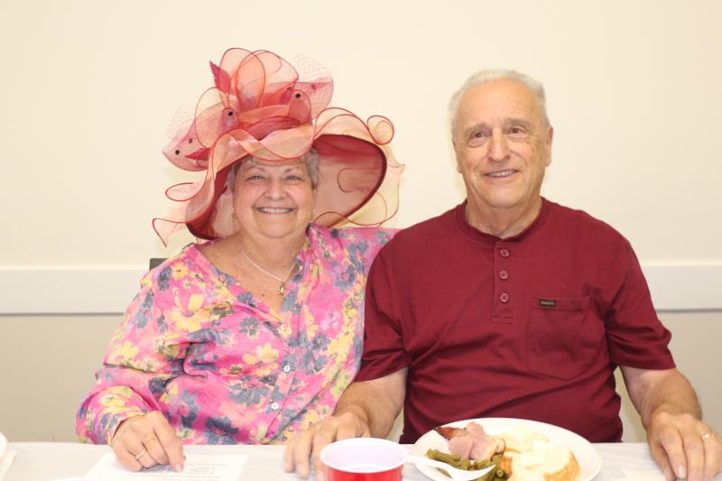 Barb Lynn and her husband Jeff, a Lewes Senior Activity Center board member, take a break from their meals to pose for a photo.