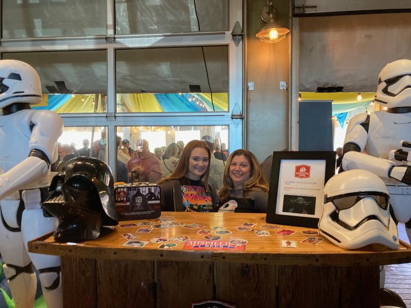 Jessalynn Kenton, left, and Laura Robbins staff the Star Wars-themed booth for Mispillion River Brewing in Milford, which took home the prize for Best Booth.