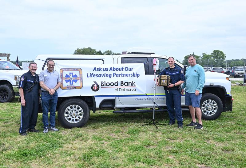 Sussex County EMS and the Blood Bank of Delmarva spread the word about their partnership allowing Sussex EMS to administer whole blood in the field. This intervention significantly increases trauma patient survivability. Shown are (l-r) Sussex EMS Director Robbie Murray, Blood Bank of Delmarva Communication Specialist Tony Prado, Sussex EMS Field Training Coordinator Jordan Dattoli and Sussex EMS Medical Director Dr. Paul Cowan. DAN COOK PHOTOS