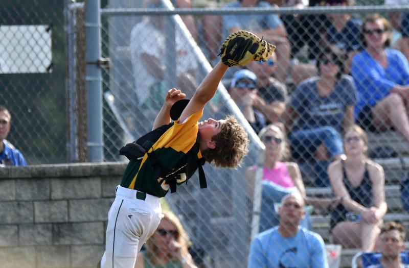 IR catcher Richard Wiggins grabs a foul ball for an out.
