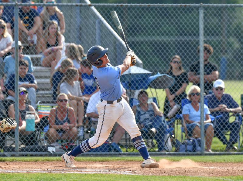 Cape junior catcher Brenn Scott watches as his hit sails out of Chris Short Field for a three-run homer.