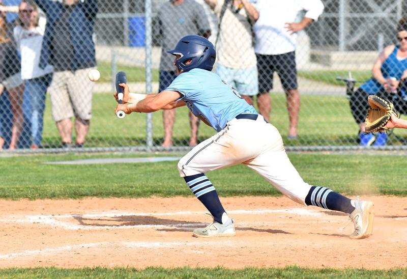 Owen Daminger lays down a successful bunt.