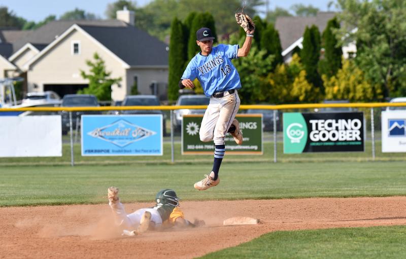 Cape shortstop Timothy Hitchcock gets up to catch a high throw at second.