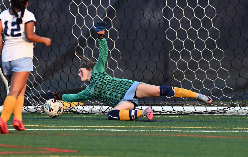 Mariner goalie Jordan Willey makes a diving save in the second half of the game.