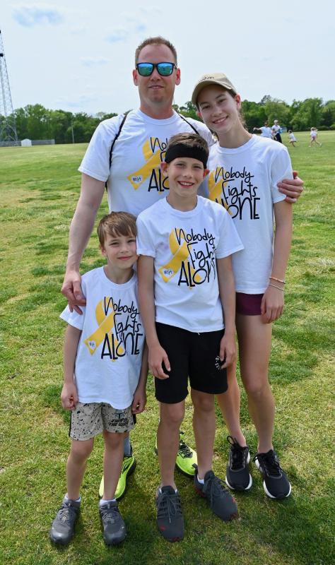 The Musin family of Lewes turns out to support Madison. They are (l-r) Martin and Veronika and, in front, Michael and Nickolas.