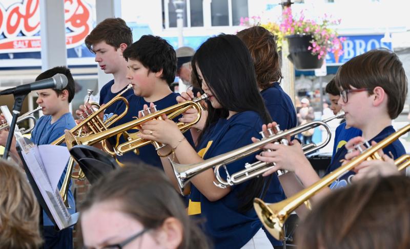The Beacon Middle School brass section fills the streets of downtown Rehoboth Beach with jazzy sounds.