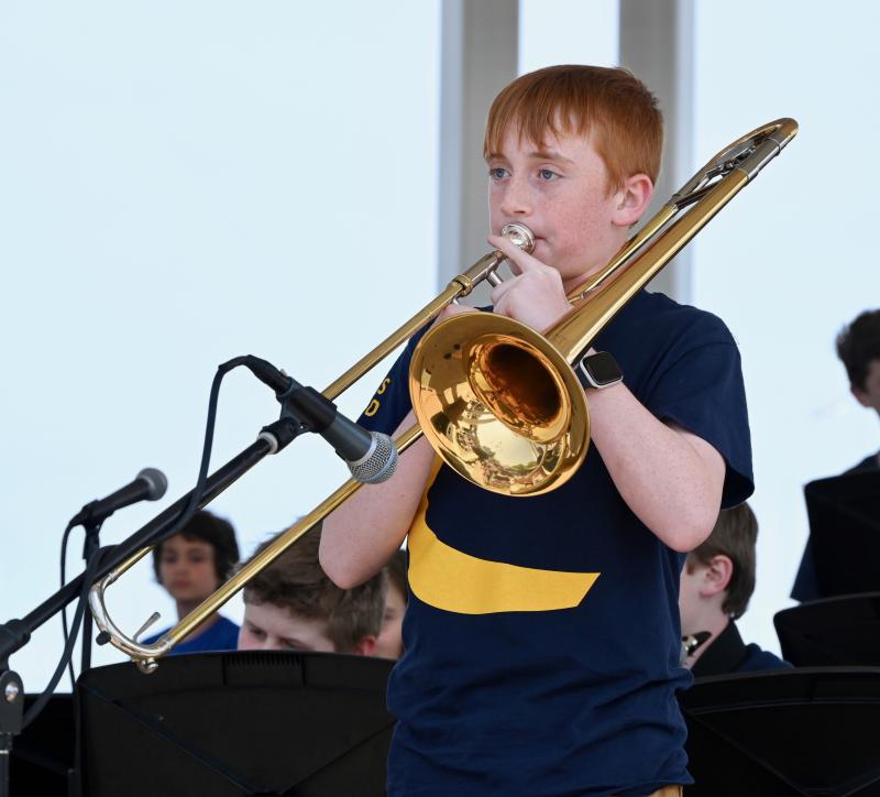 Logan Wilkerson plays a trombone solo as a member of the Beacon Middle School Jazz Band as it performs “Zoot Suit.”