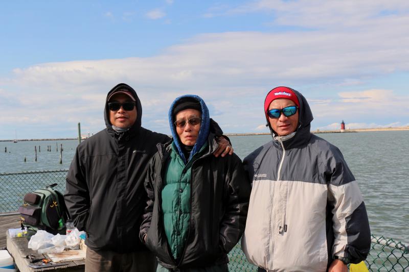 For the past 30 years, the Oliveros family has been visiting Cape Henlopen State Park to go fishing for bluefish. Reni Oliveros, their patriarch, started taking his kids to fish off the Delaware Bay when he was in his 50s. Even though it's the time of year when bluefish usually run, they haven't made their unpredictable appearance yet in 2023, much to the disappointment of Reni and his two sons. Shown are (l-r) Ron Oliveros, Reni and Rod Oliveros.