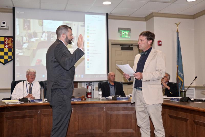 Phillip Poorman is administered the Lewes Police Department Oath of Office by Mayor Andrew Williams during the May 22 meeting.