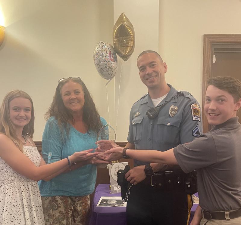 Millsboro Middle school resource officer Jonathan Zubrowski was recognized by the Optimist Club of Sussex County at its Respect for Law awards dinner May 15. Gathered are (l-r) student Kaylie Cannon, Optimist Club of Sussex County President Shelley McBride, Zubrowski and student John Teoli. SUBMITTED PHOTO