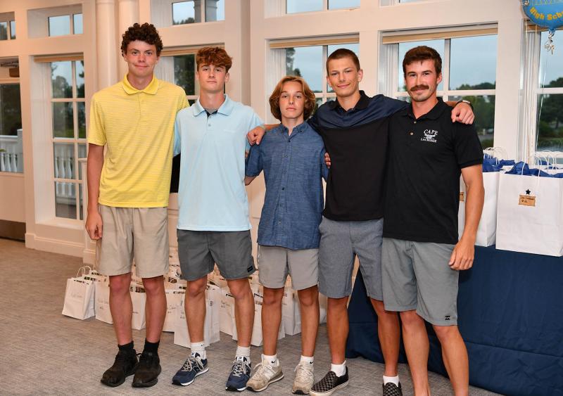 Garnering the JV Awards are (l-r) Todd Warwick, JV Spirit Award; Eric Uffelman, Defensive MVP; Braddock Smith, Offensive MVP; Mason Jack, JV MVP. They are shown with JV head coach Hank Coveleski. Not pictured is Unsung Hero Award winner Alex Barth.
