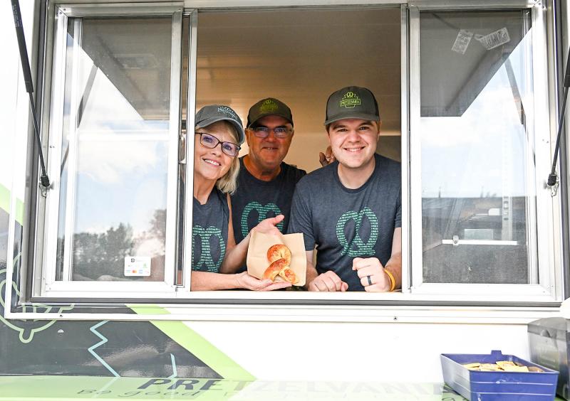 The Pretzelvania food truck gave out special ribbon pretzels for the event. Shown are owners (l-r) Wendy, Garry and Emmitt Smith.