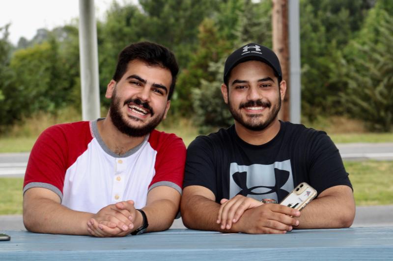Jordanians Lowrence Alzboon, left, and Jawdat Jabr were laughing and enjoying themselves following Epworth UMC’s June 20 dinner.